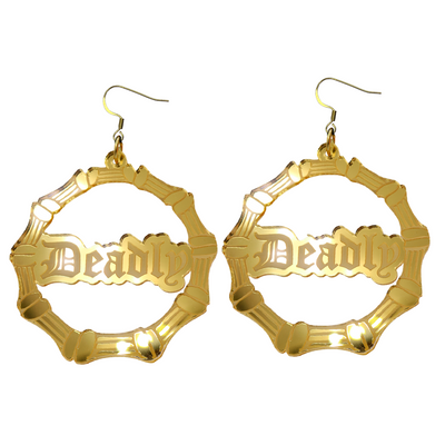 An image of Haus of Dizzy's large gold mirror bamboo hoops with 'Deadly' text in old english font, with hook tops.