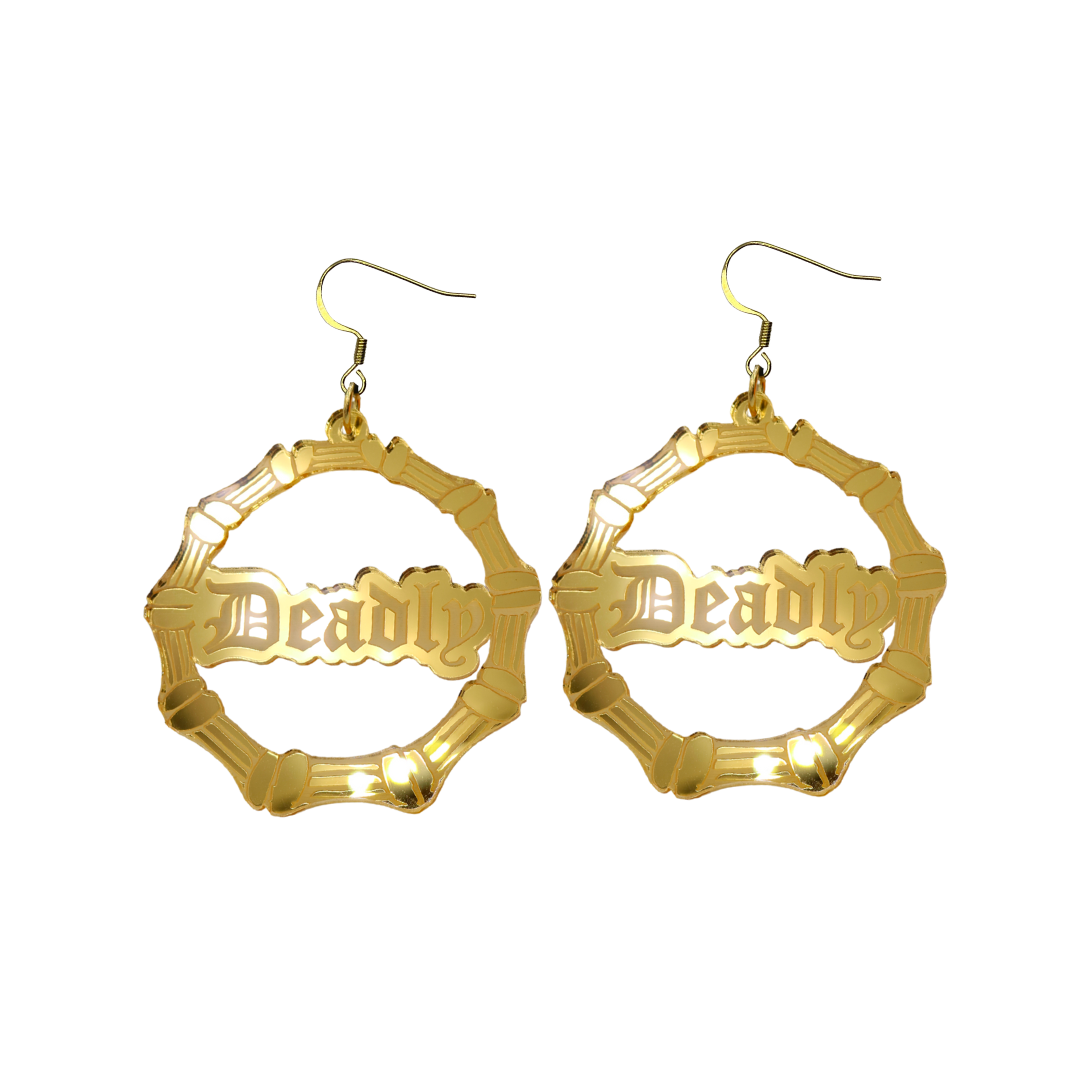 An image of Haus of Dizzy's small gold mirror bamboo hoops with 'Deadly' text in old english font, with hook tops.