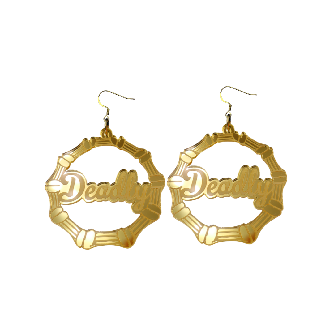 An image of Haus of Dizzy's small gold mirror bamboo hoops with 'Deadly' text in ollie cursive font, with hook tops.