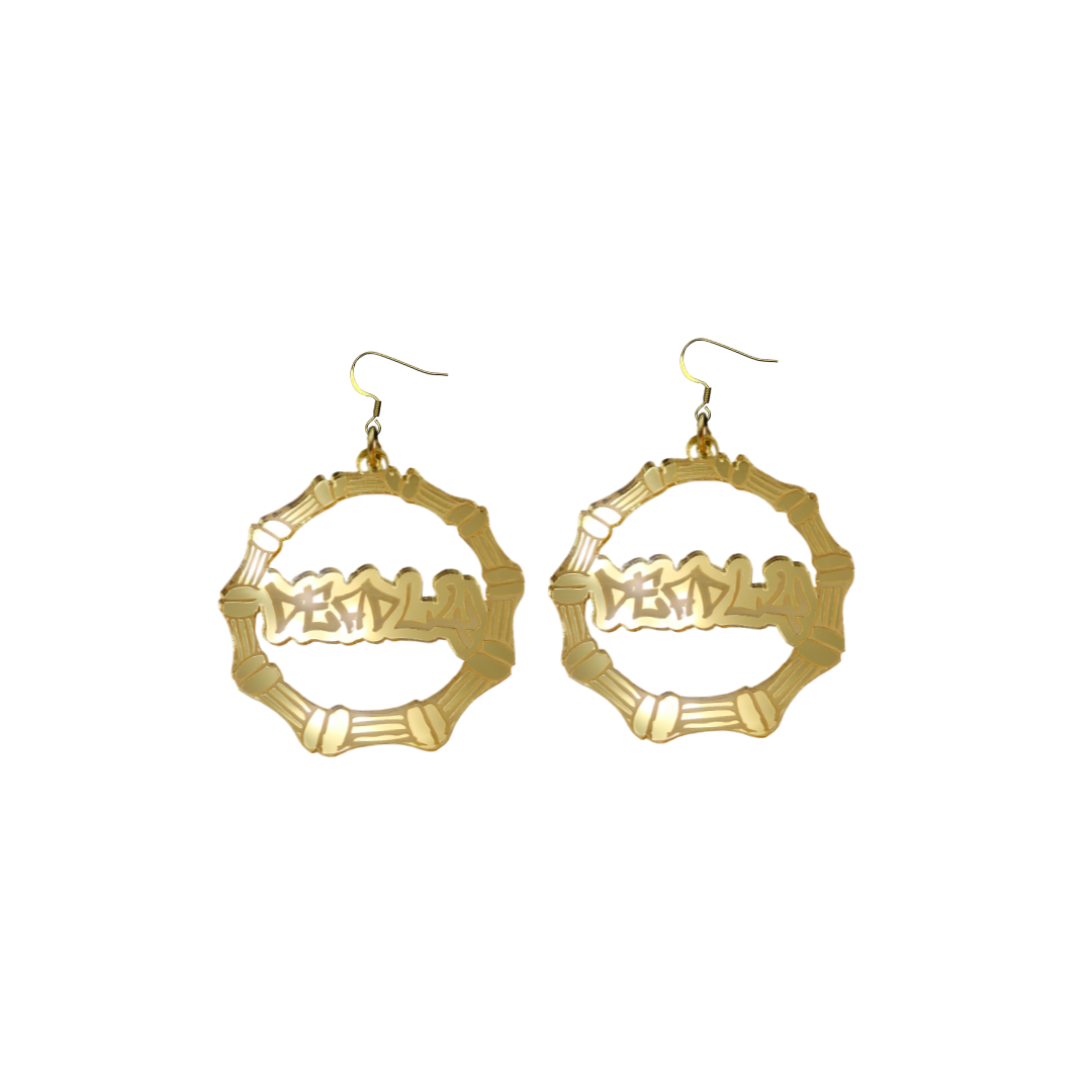 An image of Haus of Dizzy's small gold mirror bamboo hoops with 'Deadly' text in graffiti font, with hook tops.