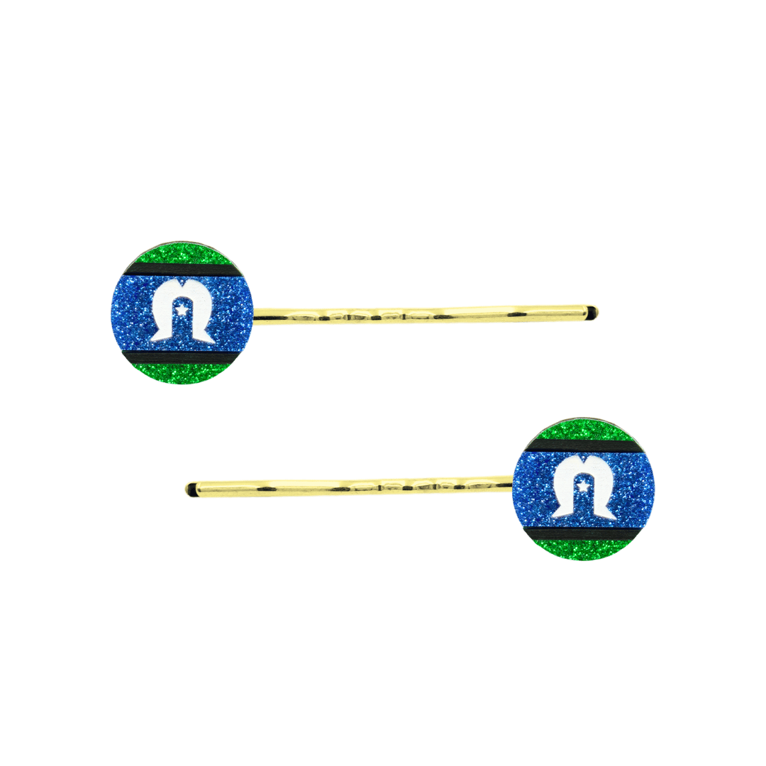 An Image of Haus of Dizzy's Circle Shaped Glitter Torres Strait Islander Flag Hair Pins. Flags are on Gold Pins