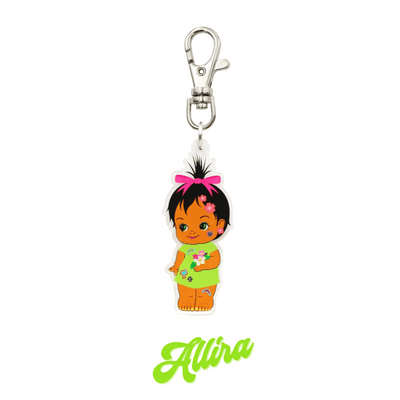 An image of Haus of Dizzy's Dizzy Chicks acrylic Keyring, with a doll with short black straight pixie hair in a green one piece playsuit and flower acrylic heart earrings on a parrot clasp. Green Colour "Allira" Cursive Text is at the bottom of the image.