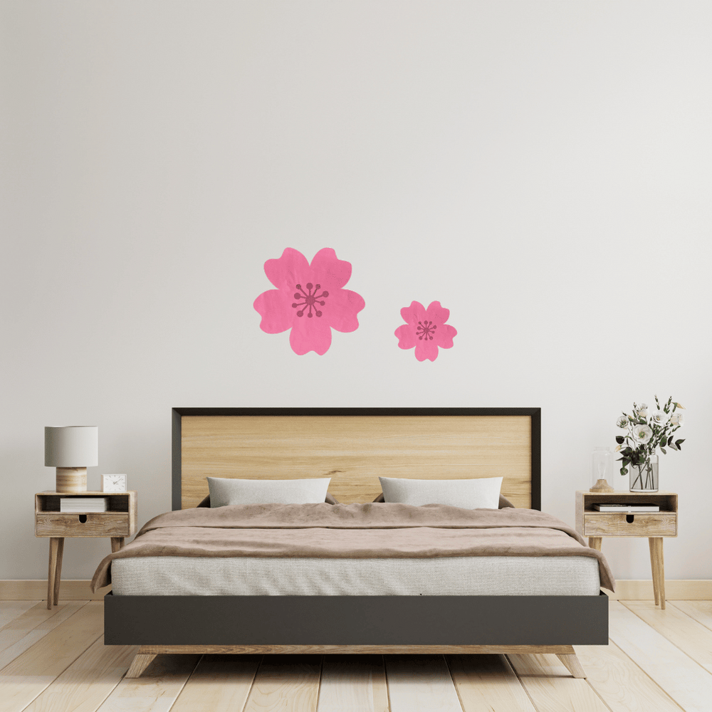 Bedroom with Haus of Dizzy's mirror cherry blossom wall art on a light gray wall.