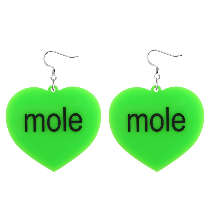 An image of Haus of Dizzy's large Brat Summer mole heart shaped dangle earrings, with mole text on neon green acrylic and a hook top.