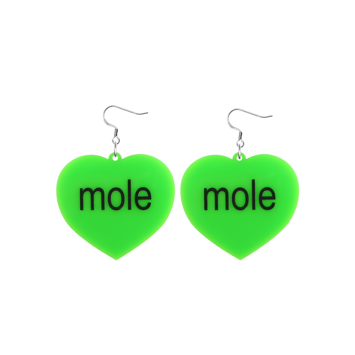 An image of Haus of Dizzy's small Brat Summer mole heart shaped dangle earrings, with mole text on neon green acrylic and a hook top.