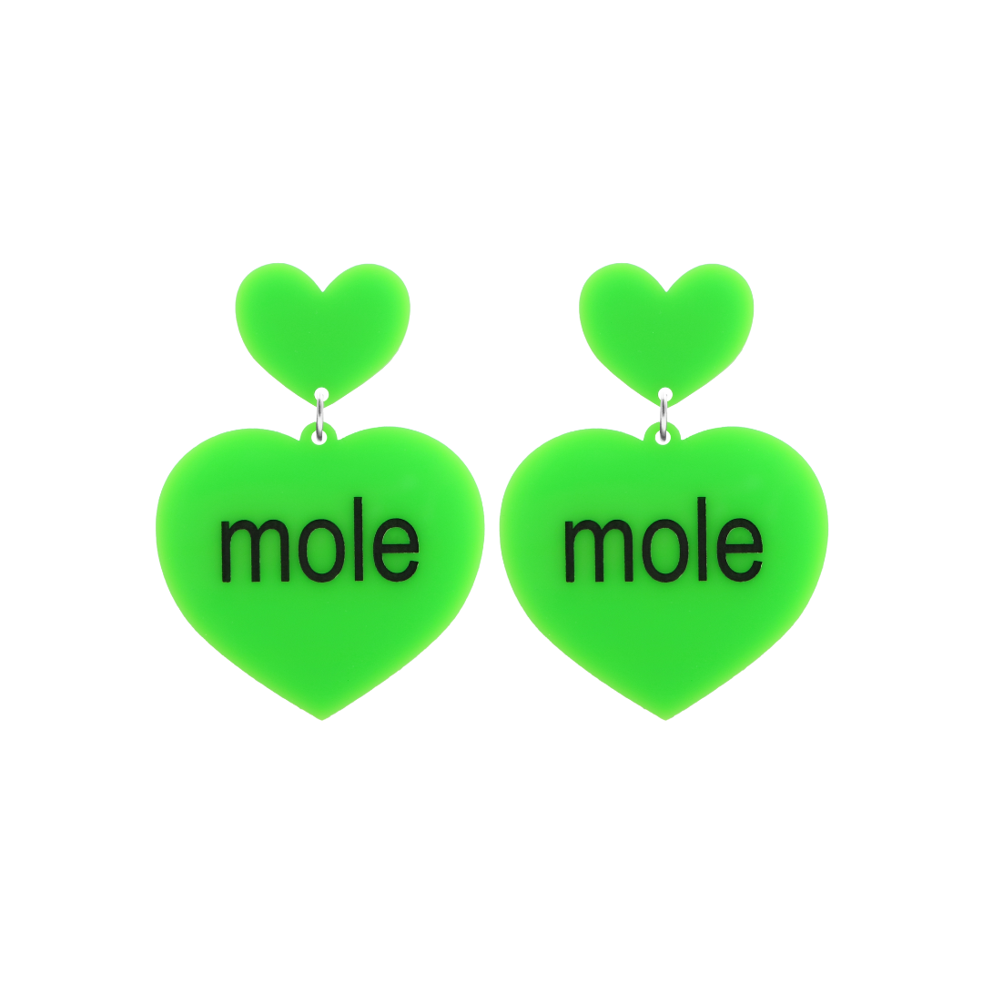 An image of Haus of Dizzy's small Brat Summer mole heart shaped dangle earrings, with mole text on neon green acrylic and a neon green heart top.