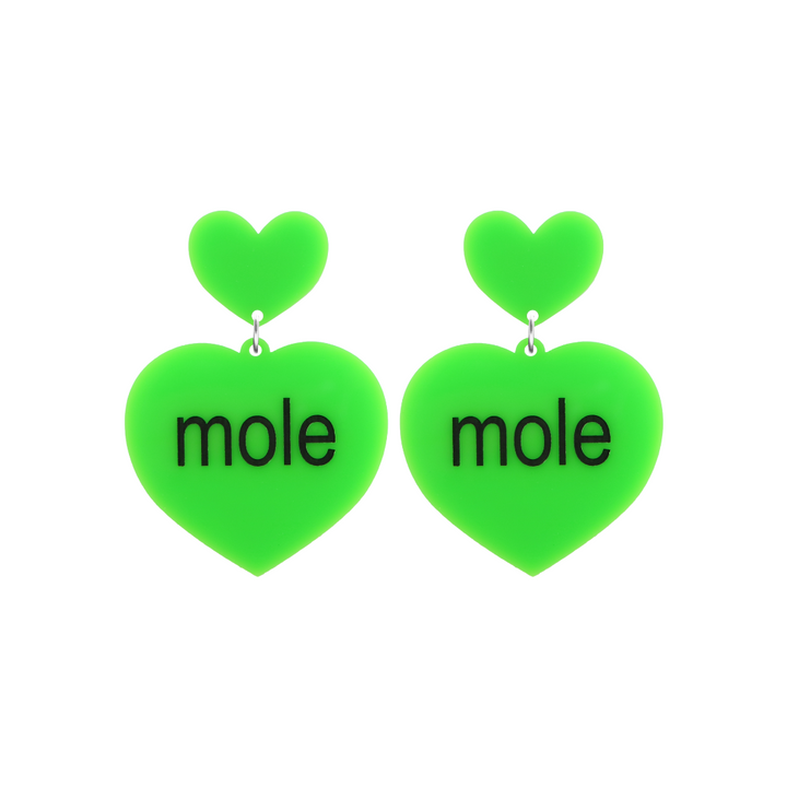 An image of Haus of Dizzy's small Brat Summer mole heart shaped dangle earrings, with mole text on neon green acrylic and a neon green heart top.