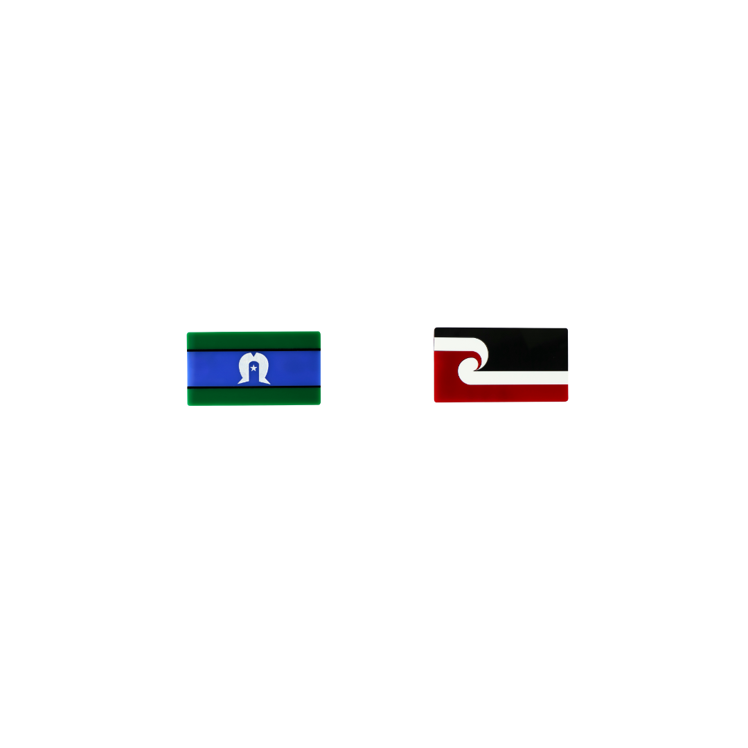 An image of Haus of Dizzy's 'First Nations Pride'  Torres Strait Islander flag and Maori flag, Rectangle shaped earring studs, on green, blue, black, red and white gloss acrylic with red and white paint fill.