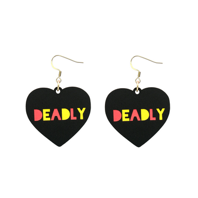 An image of Haus of Dizzy's small black acrylic dangle earrings with Deadly text in red and yellow, with a hook top.