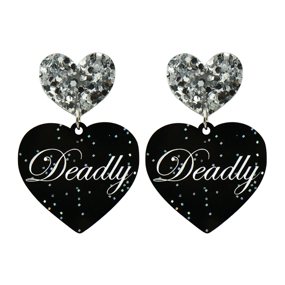 Black glitter Heart-shaped earrings with white text that says 'Deadly', and silver glitter heart tops on a white background