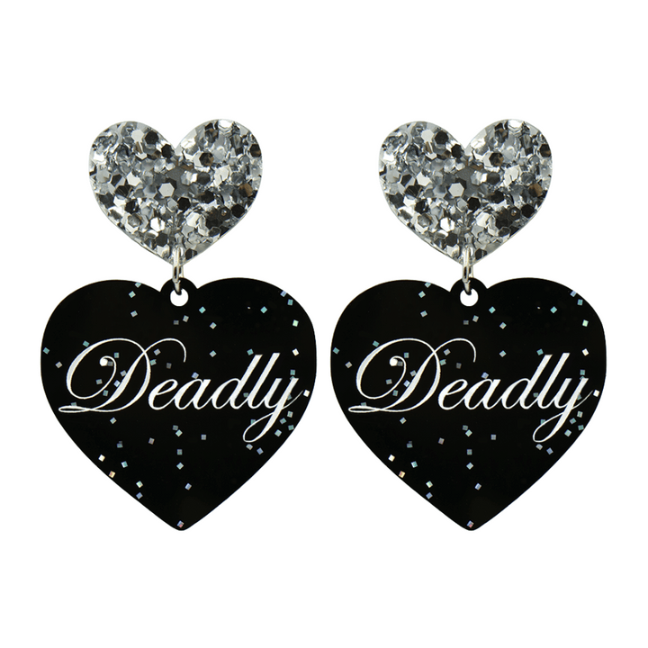 Black glitter Heart-shaped earrings with white text that says 'Deadly', and silver glitter heart tops on a white background
