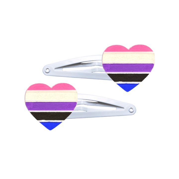 Two heart-shaped gender-fluid pride flag hair clips on a white background
