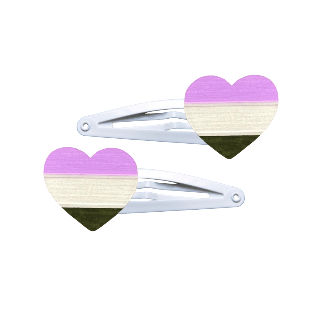 Two heart-shaped gender-queer pride flag hair clips on a white background