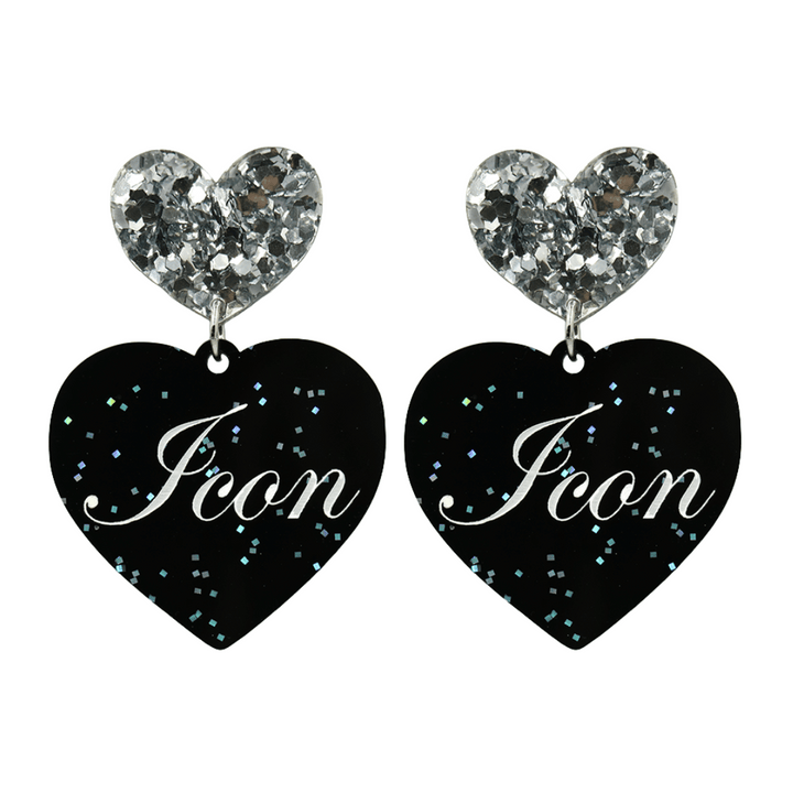 Black glitter Heart-shaped earrings with white text that says 'Icon', and silver glitter heart tops on a white background