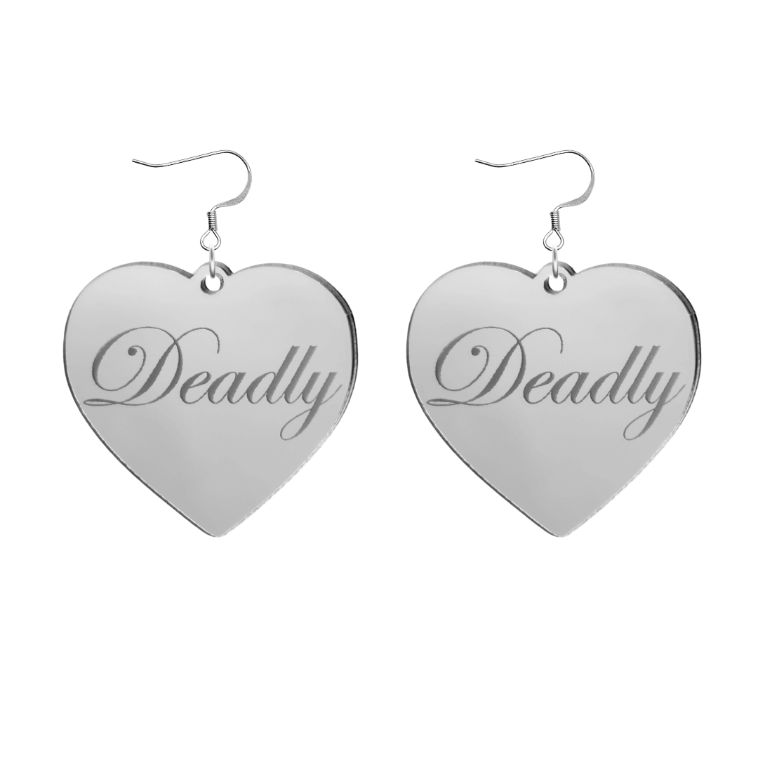 Heart-shaped silver mirror acrylic earrings with 'Deadly' engraving on a white background