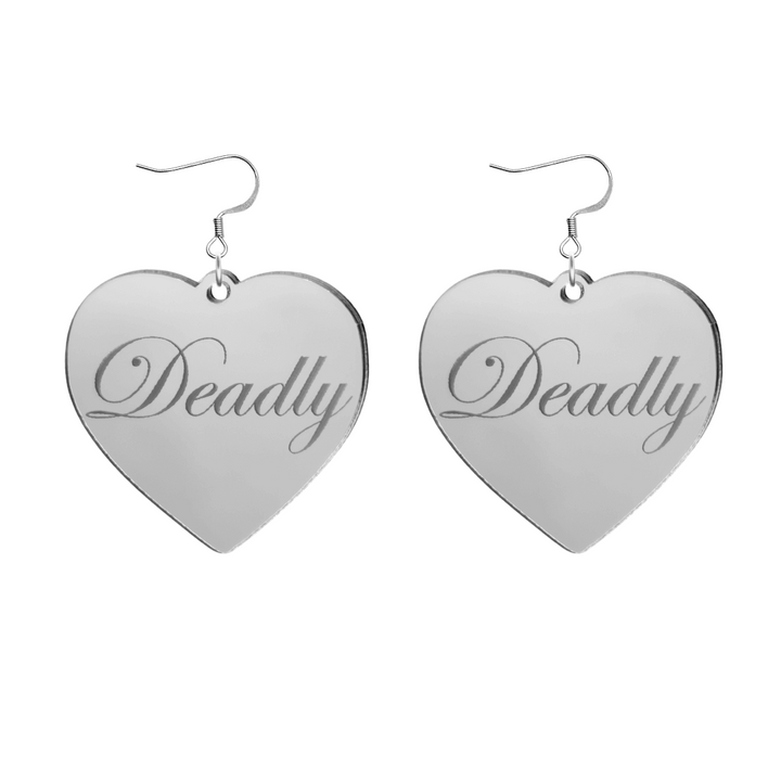 Heart-shaped silver mirror acrylic earrings with 'Deadly' engraving on a white background