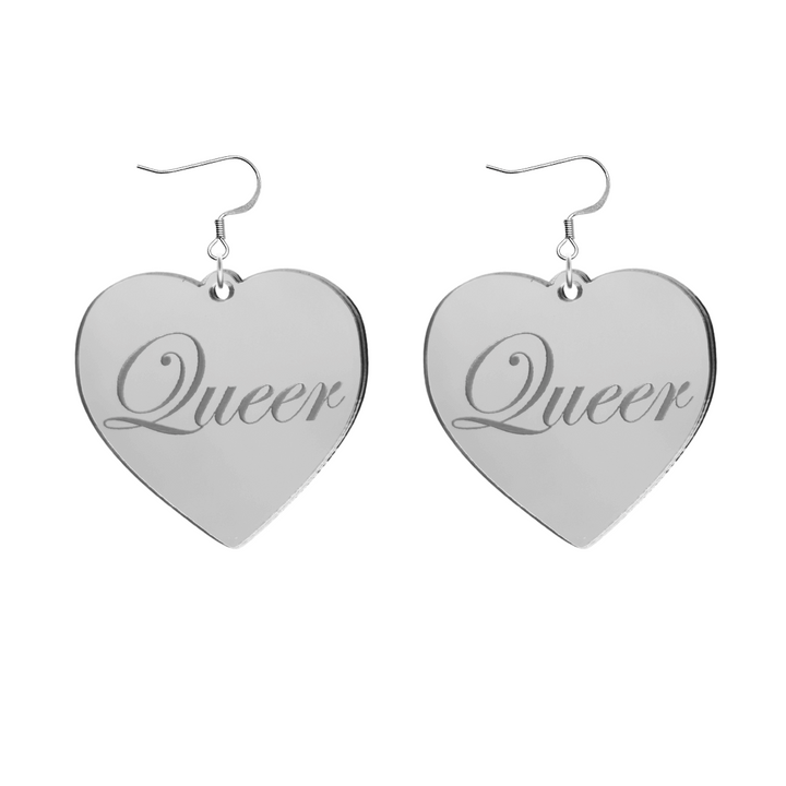 Heart-shaped silver mirror acrylic earrings with 'Queer' engraving on a white background