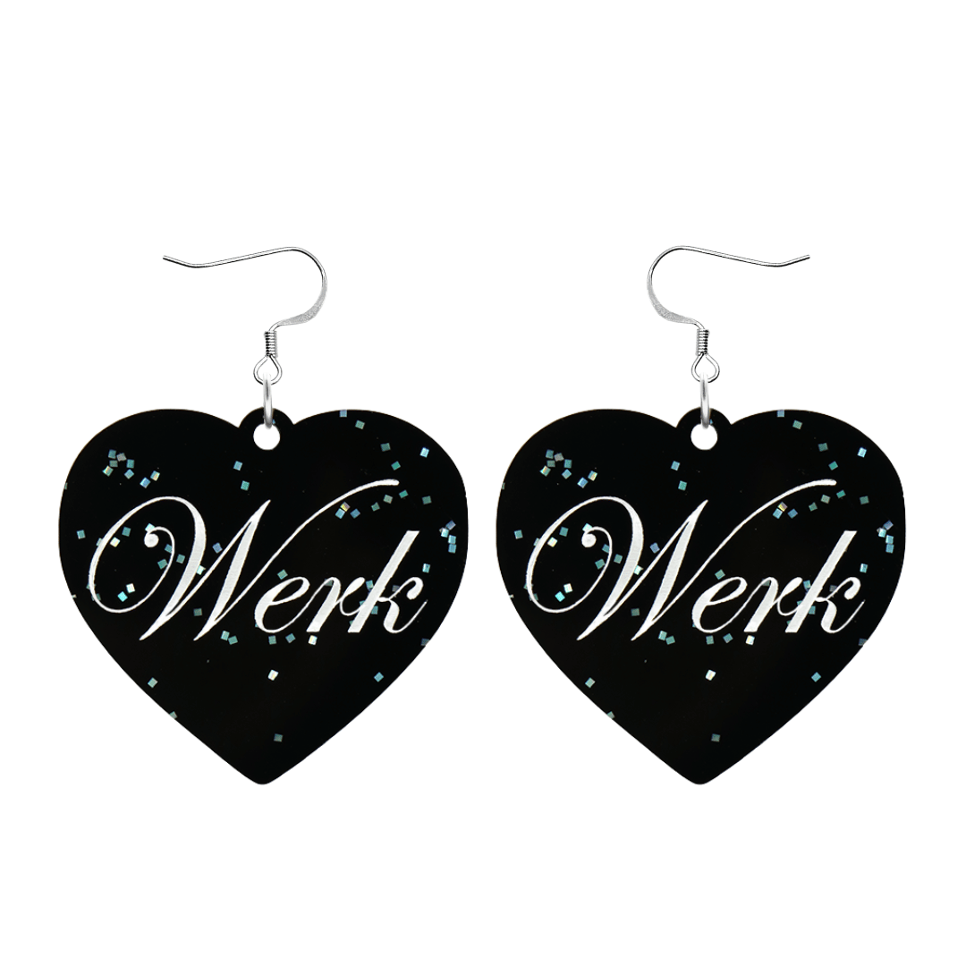 Black glitter Heart-shaped earrings with white text that says 'Werk', and silver hooks (no heart tops) on a white background