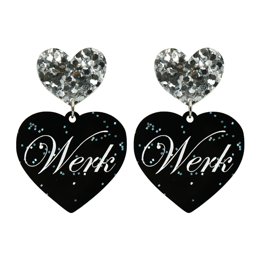Black glitter Heart-shaped earrings with white text that says 'Werk', and silver glitter heart tops on a white background