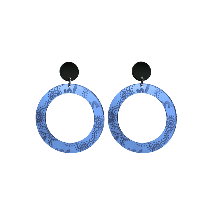Pair of small, blue mirror, acrylic hoop earrings with Aboriginal artwork pattern with black circular earring top. Earrings are on a white background
