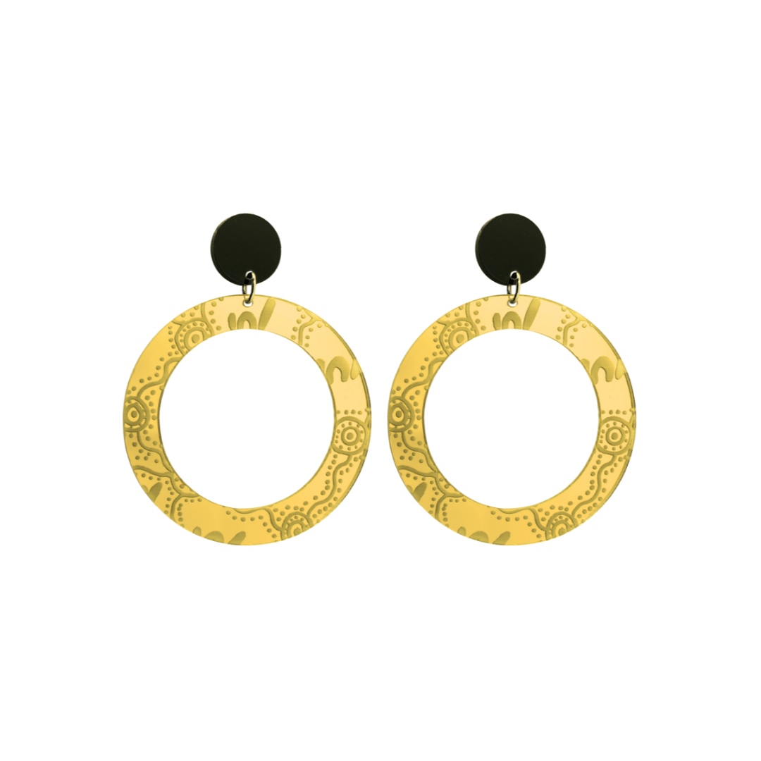 Pair of small, gold mirror, acrylic hoop earrings with Aboriginal artwork pattern with black circular earring top. Earrings are on a white background
