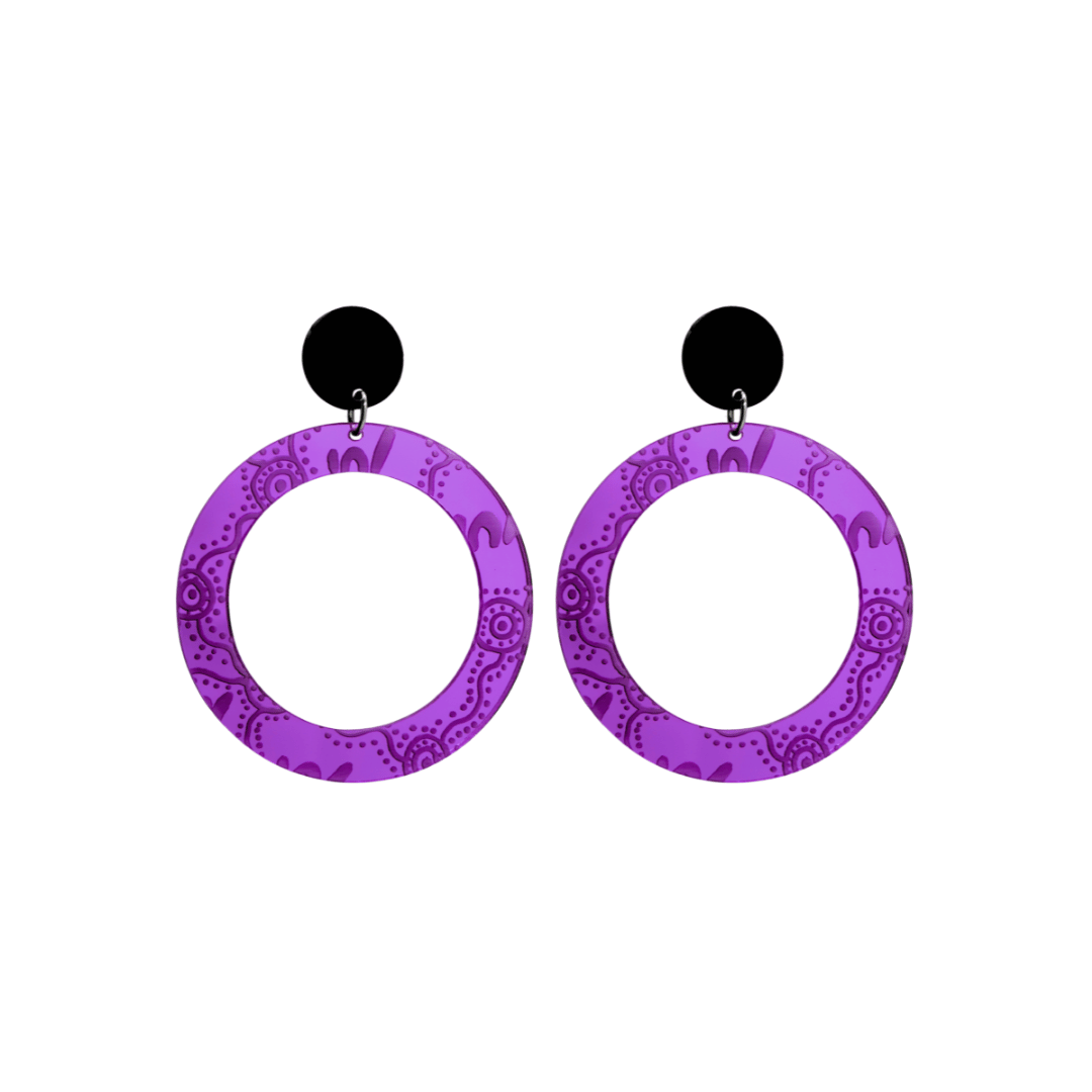 Pair of small, purple mirror, acrylic hoop earrings with Aboriginal artwork pattern with black circular earring top. Earrings are on a white background