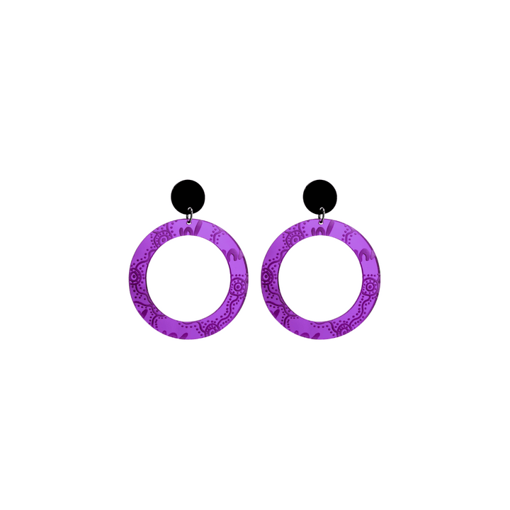 Pair of extra small, purple mirror, acrylic hoop earrings with Aboriginal artwork pattern with black circular earring top. Earrings are on a white background