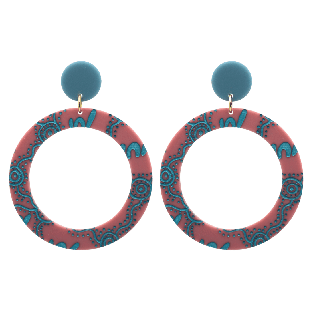 haus of dizzy pair of dusty rose acrylic earrings with Aboriginal art design, that means women in Wiradjuri language, and blue circle tops on a white background size large