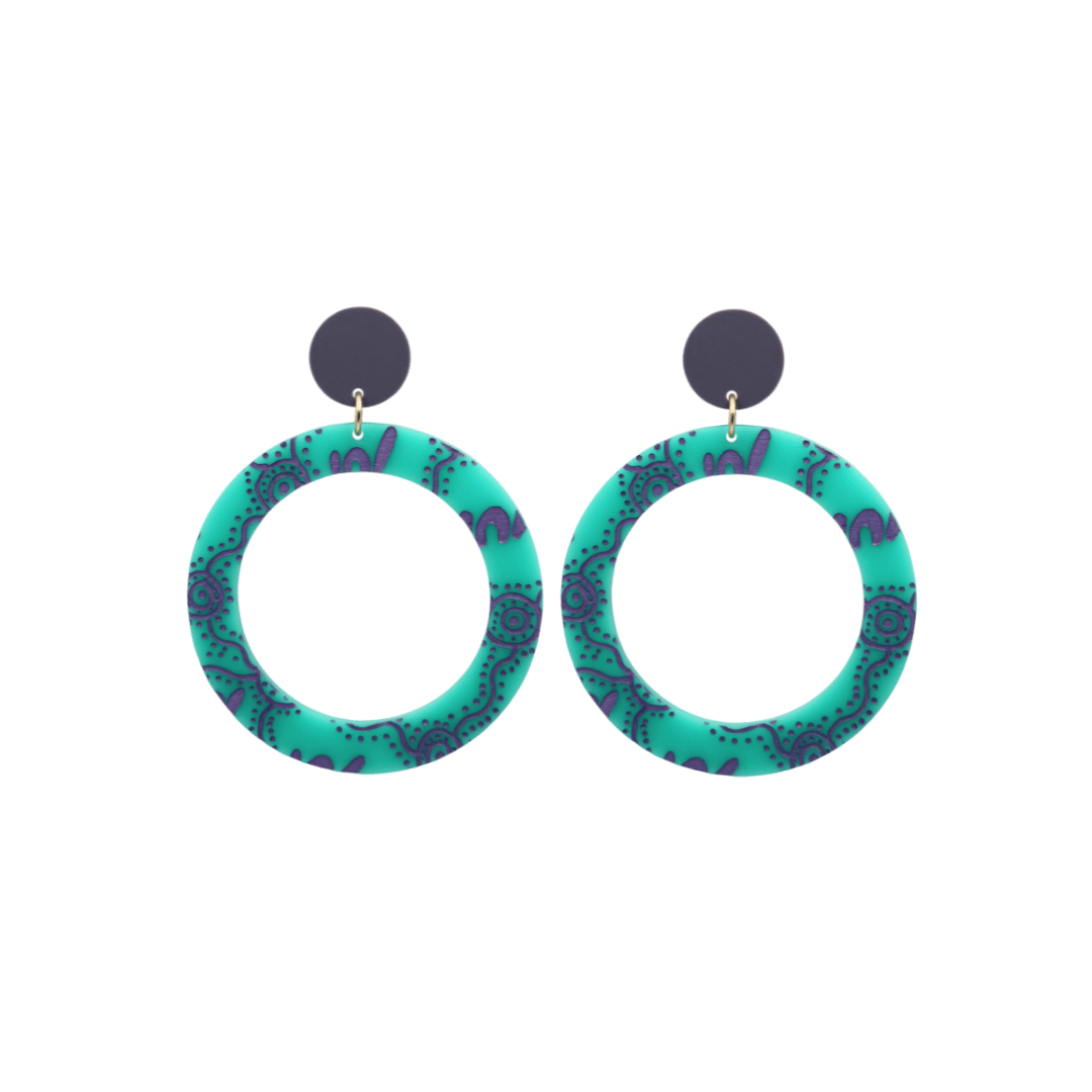 haus of dizzy pair of dusty teal acrylic earrings with Aboriginal art design, that means women in Wiradjuri language, and dark lavender circle tops on a white background size small