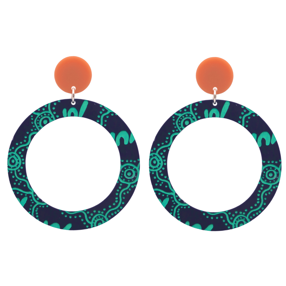 haus of dizzy pair of denim navy acrylic earrings with Aboriginal art design, that means women' in Wiradjuri language, and burnt orange circle tops on a white background size large