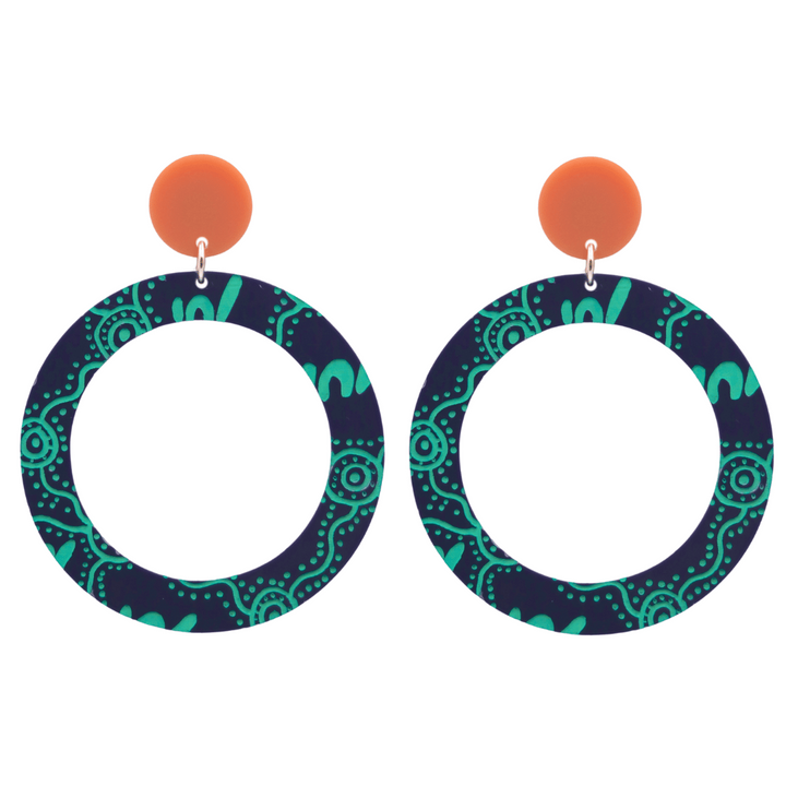 haus of dizzy pair of denim navy acrylic earrings with Aboriginal art design, that means women' in Wiradjuri language, and burnt orange circle tops on a white background size large