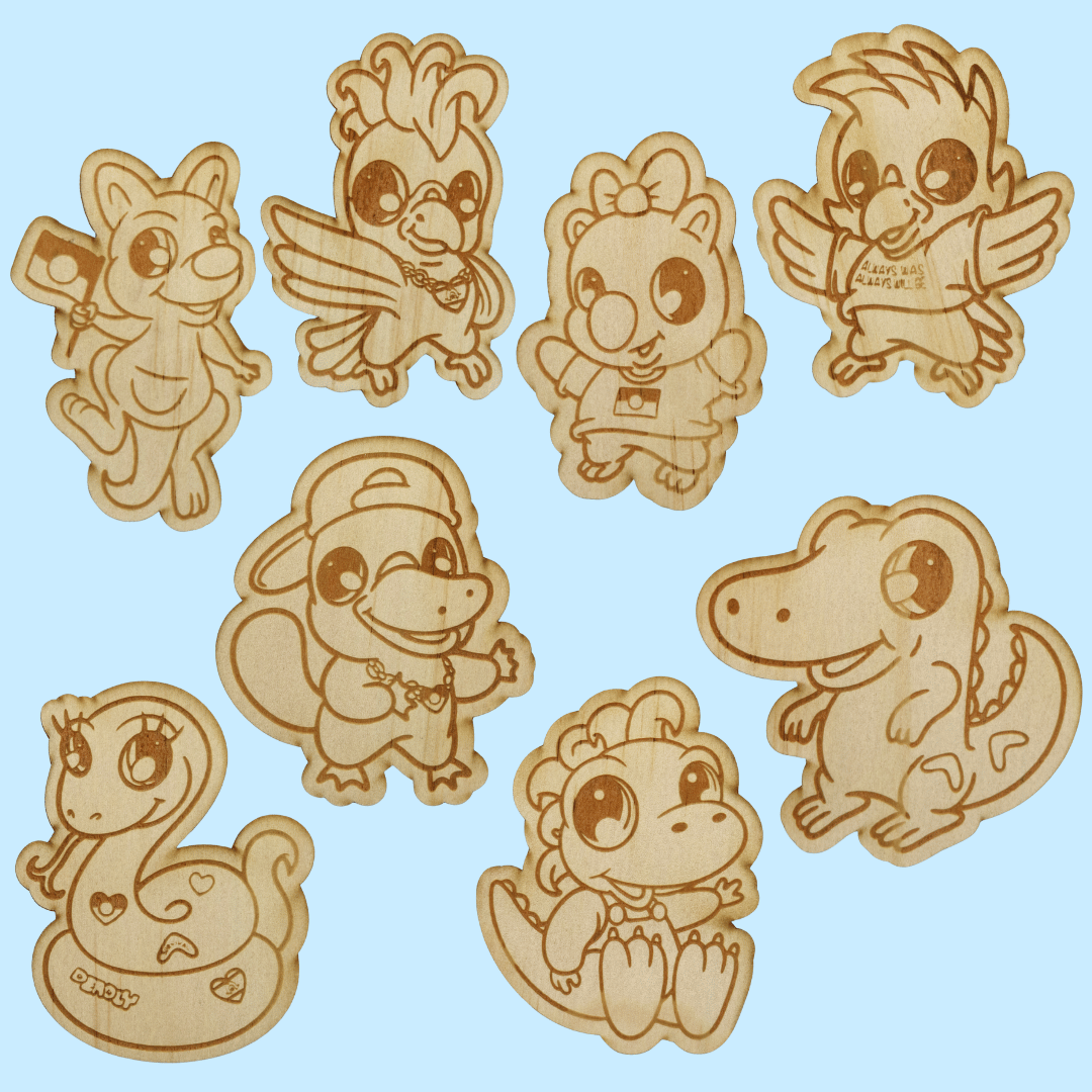 set of wooden haus of ziggy lee haus of dizzy animal colour in magnets on a light blue background