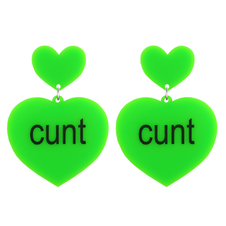 An image of Haus of Dizzy's large brat summer heart shaped dangle earrings, with cunt text on neon green acrylic and a neon green heart top.