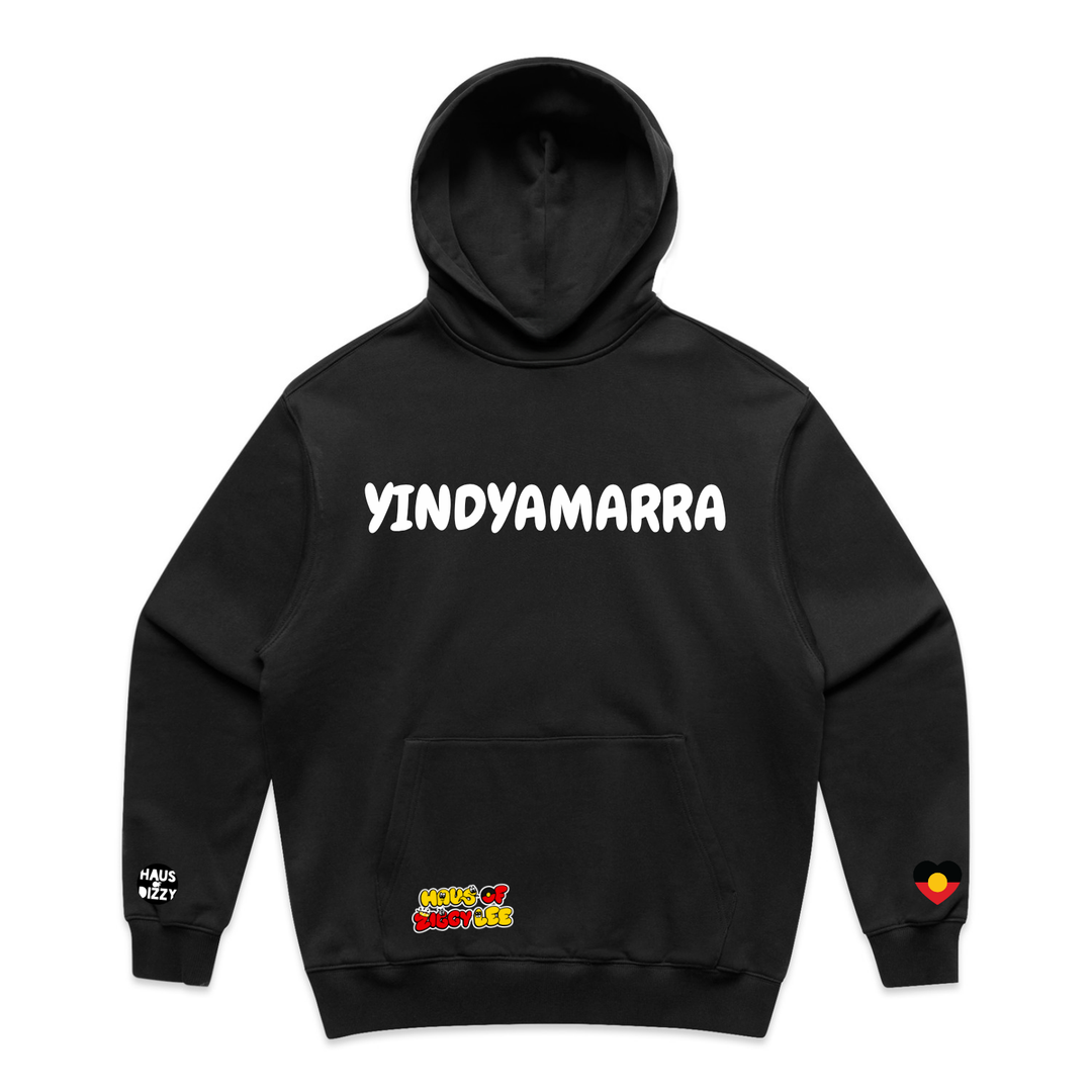 An image of Haus of Dizzy x Haus of Ziggy Lee  Yindyamarra black hoodie, with white text ‘respect be gentle be polite give honour slow down take responsibility’’ in the centre and Haus of Dizzy logo on the left sleeve and aboriginal heart flag on the right sleeve. 