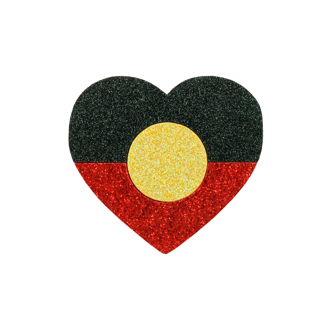 An image of Haus of Dizzy's large Indigenous pride glitter acrylic heart pin with Aboriginal flag.