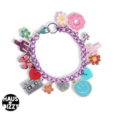 an image of a charm bracelet on a purple chain with pink cactus, flower, butterfly and donut charms ; blue smiley, heart charms, silver cassette tape and heart charms, greem flower charm and red heart and flower charm . Charms are a mixture of enamel and acrylic materials. and 