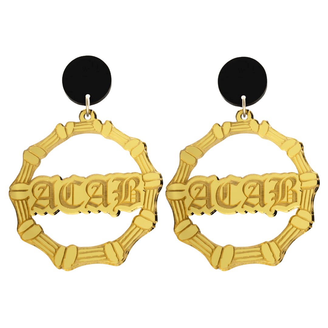 haus of dizzy acrylic gold mirror bamboo hoops with old english text that reads ACAB with black circle stud tops size large
