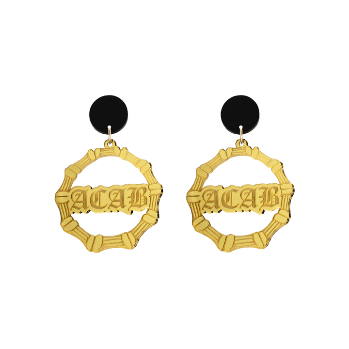 haus of dizzy acrylic gold mirror bamboo hoops with old english text that reads ACAB with black circle stud tops size small