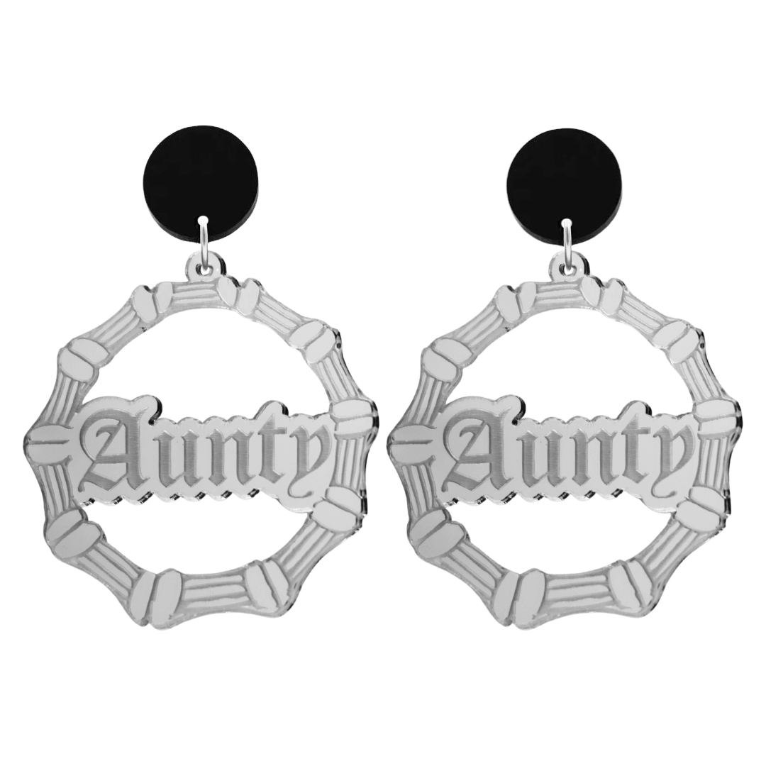 haus of dizzy acrylic silver mirror bamboo hoops with old english text that reads aunty with black circle stud tops size large