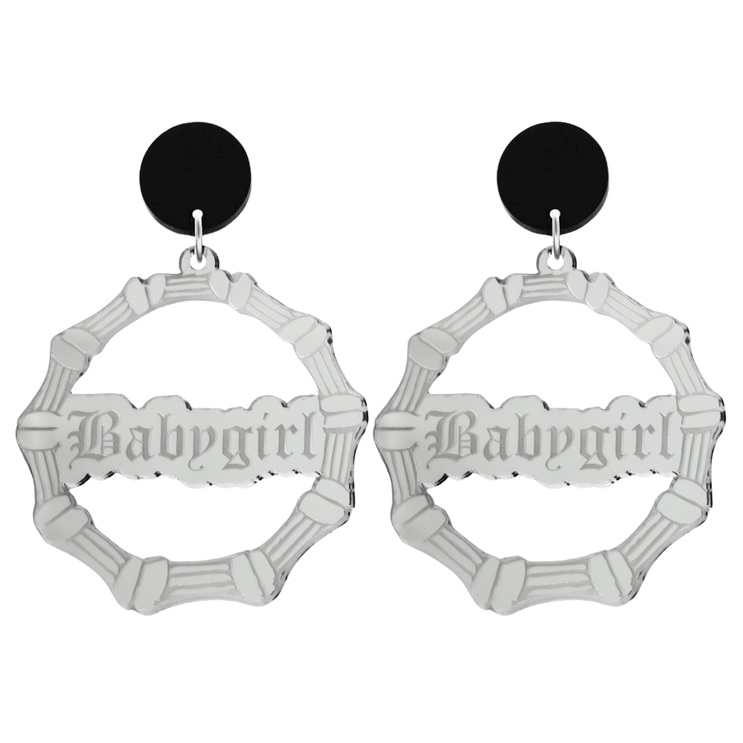 haus of dizzy acrylic silver mirror bamboo hoops with old english text that reads Babygirl with black circle stud tops size large