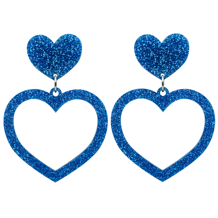haus of dizzy glitter barbie heart earrings with blue glitter size large