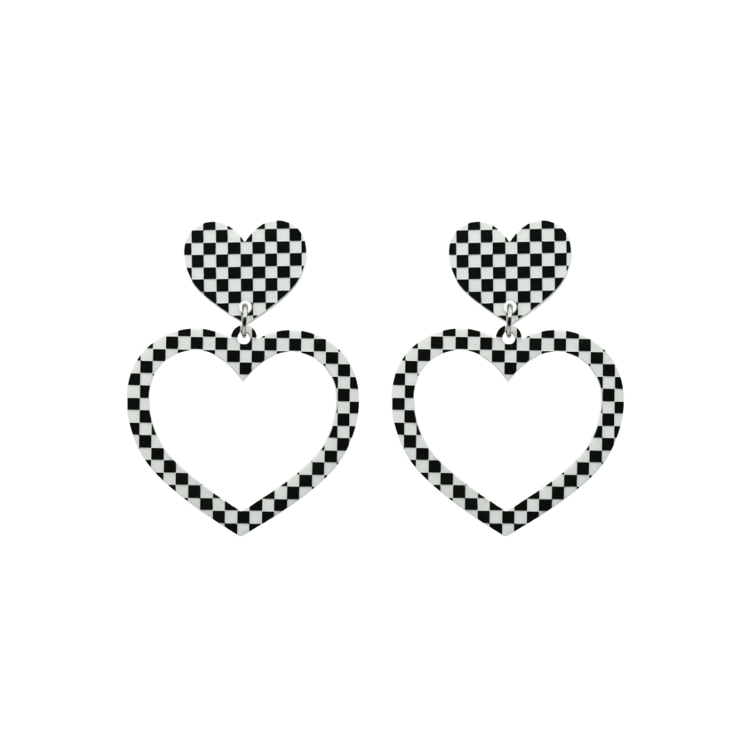 haus of dizzy black and white barbie heart earrings in checkerboard print size small
