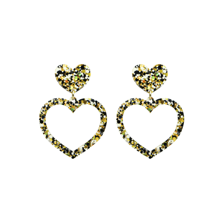 haus of dizzy confetti barbie heart earrings with white black and gold glitter through a clear base size small