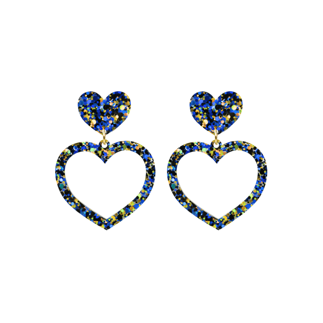 haus of dizzy confetti barbie heart earrings with blue and gold glitter through a clear base size small