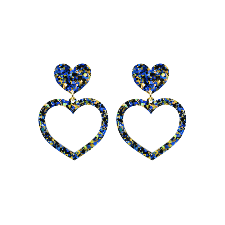 haus of dizzy confetti barbie heart earrings with blue and gold glitter through a clear base size small