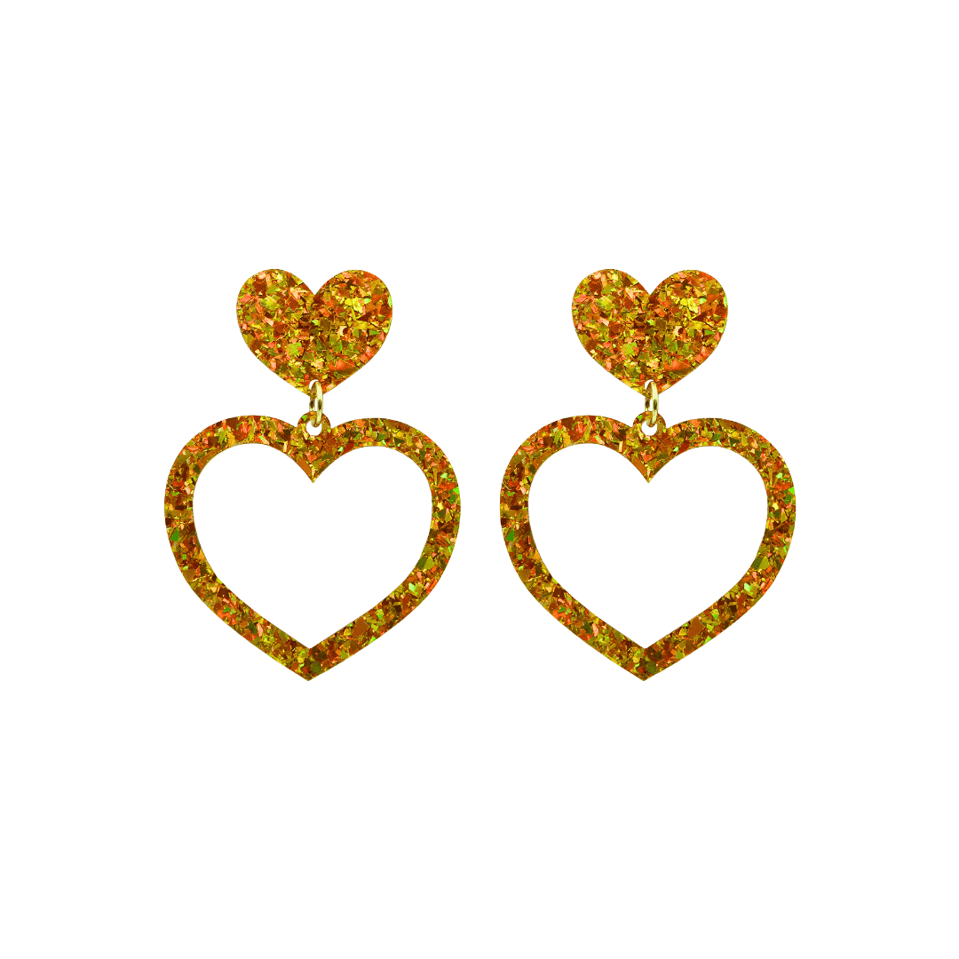 haus of dizzy crystal barbie hearts in amber size small. hearts are filled with gold/yellow holographic foil/glitter