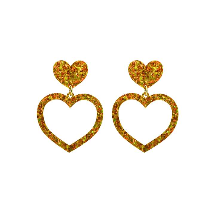 haus of dizzy crystal barbie hearts in amber size small. hearts are filled with gold/yellow holographic foil/glitter