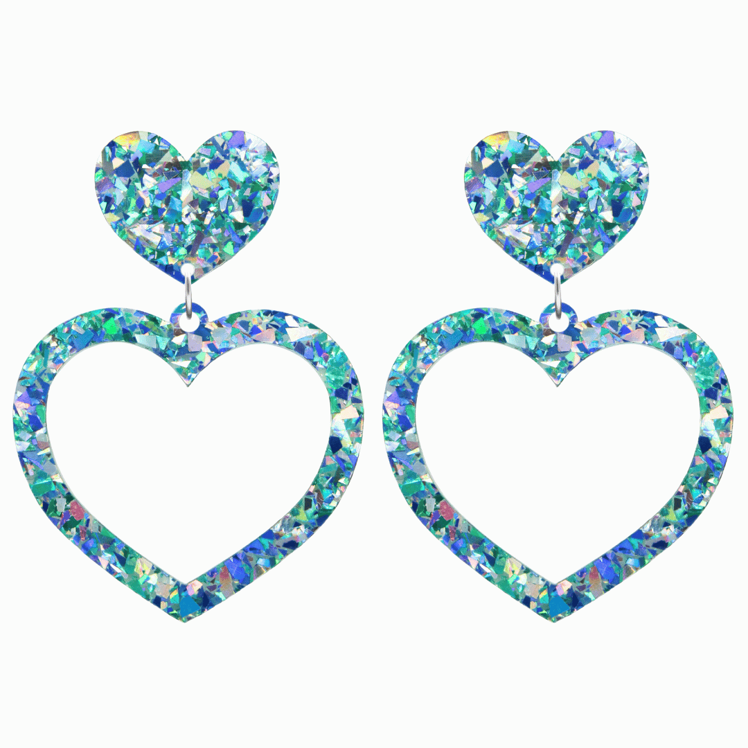 haus of dizzy crystal barbie hearts in aquamarine size large. hearts are filled with blue holographic foil/glitter
