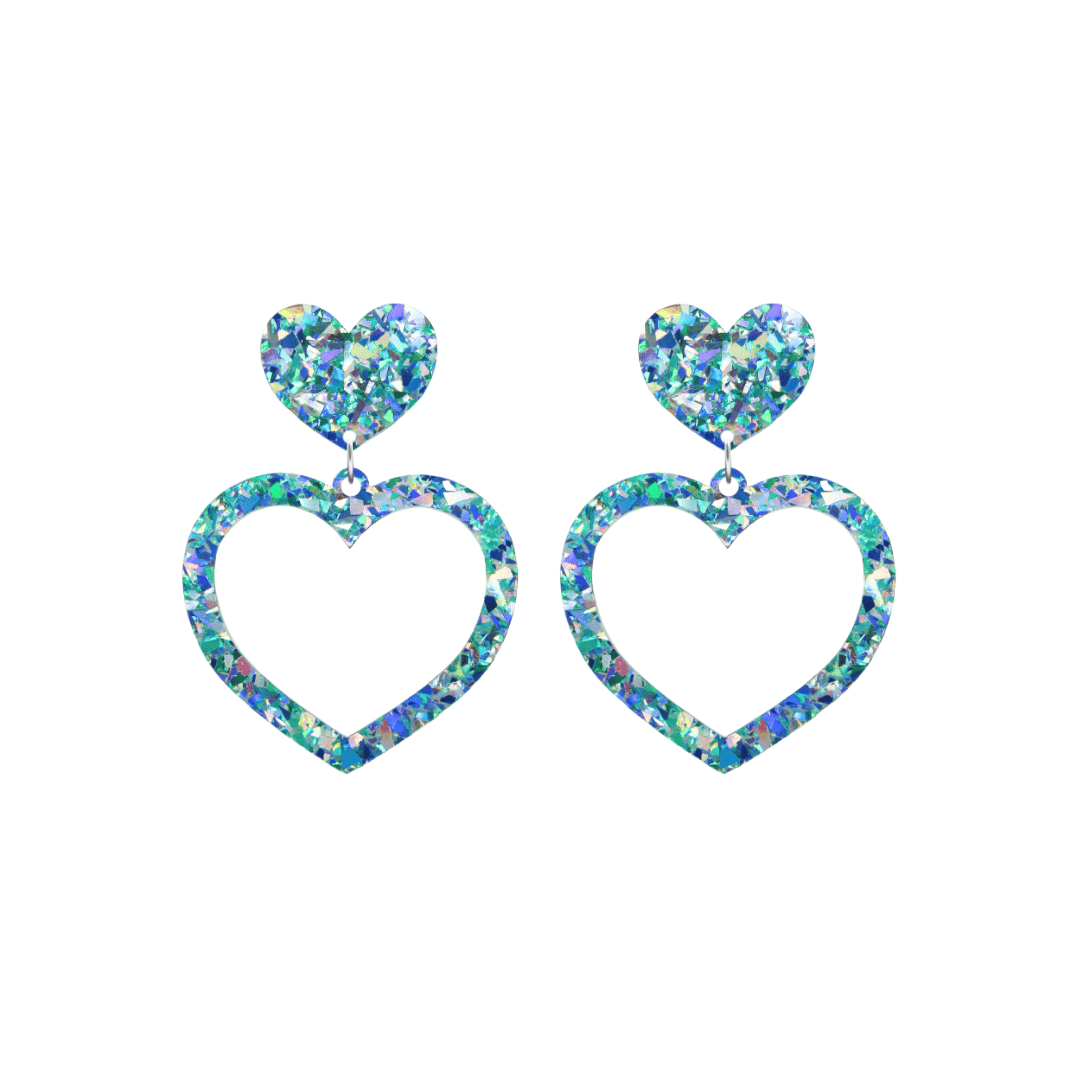haus of dizzy crystal barbie hearts in aquamarine size small. hearts are filled with blue holographic foil/glitter