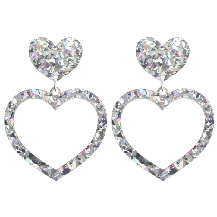 haus of dizzy crystal barbie hearts in clear quartz size large. hearts are filled with silver/clear holographic foil/glitter